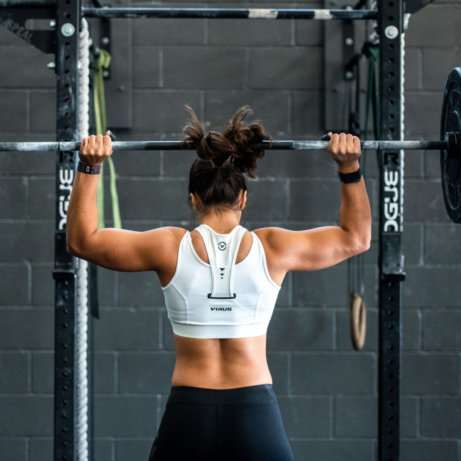 Athlete lifting weights in a gym