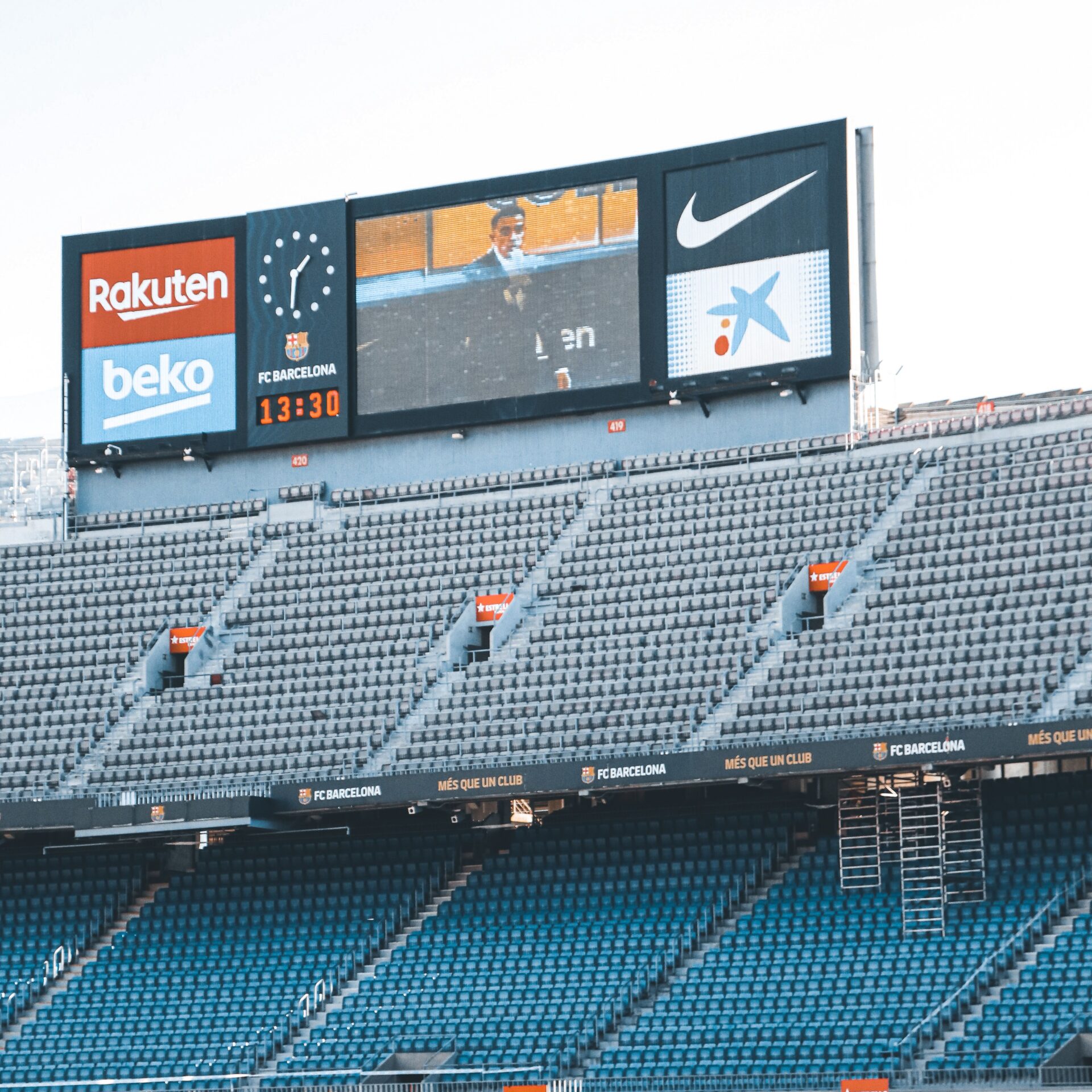 Stadium scoreboard above empty seats
