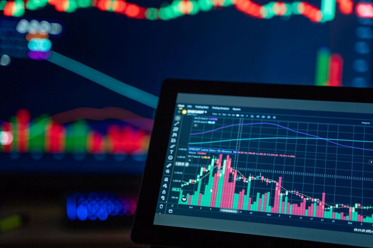 Performance data charts on a tablet screen